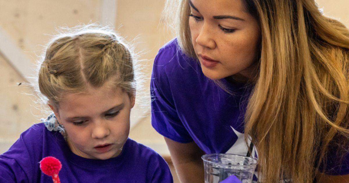 Tween girls building confidence through martial arts and mentorship at a Girls on Fire workshop in Edmonton, Alberta.