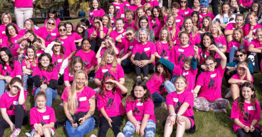  Group of girls at Girls on Fire Confidence Conference in Red Deer Alberta learning teamwork, confidence, and growth mindset
