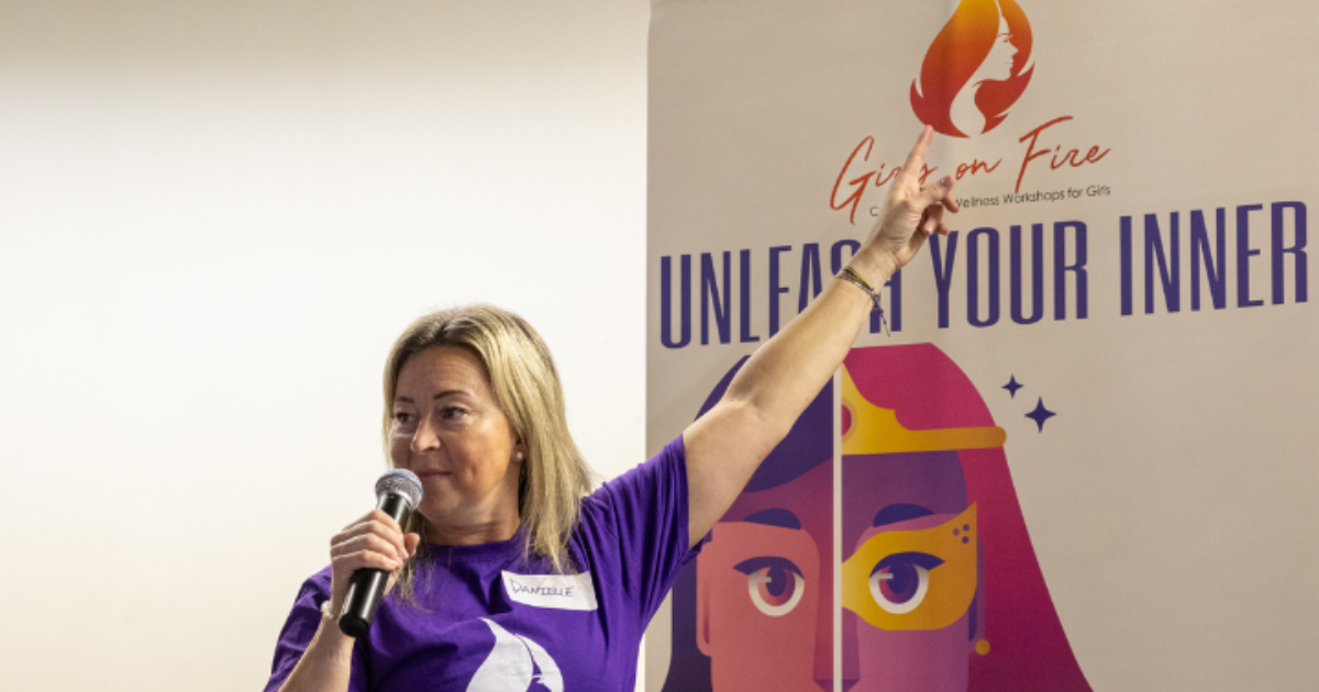 Instructor leading Girls on Fire confidence workshop in Edmonton, teaching girls about growth mindset and empowerment